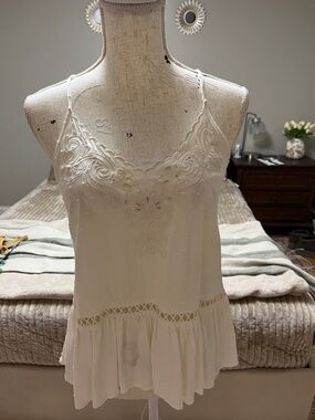 Spaghetti strap ivory ruffle bottom top - size small